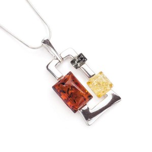 Srebrny wisiorek zdobiony bursztynem w trzech kolorach